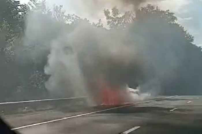 Motorway blaze horror as car engulfed in flames on M8 during rush hour traffic