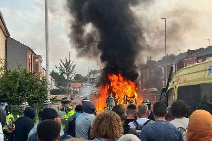 Police van set on fire and officer injured in 'sickening' scenes at Southport protest