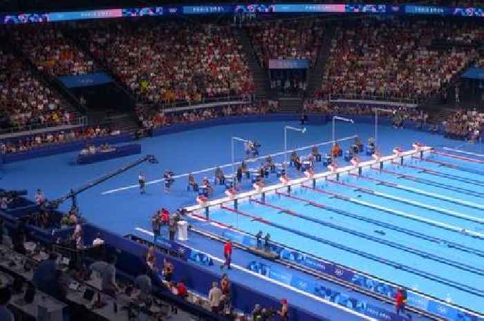 Olympic swimmer collapses and given oxygen in medical emergency