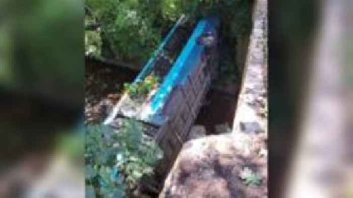 Five rescued as bus plunges 30ft off bridge
