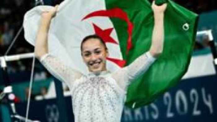 Algeria's Nemour makes history with uneven bars gold