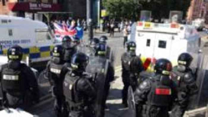 Four men charged after disorder following Belfast protest