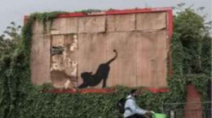 Sixth Banksy of stretching cat on London billboard