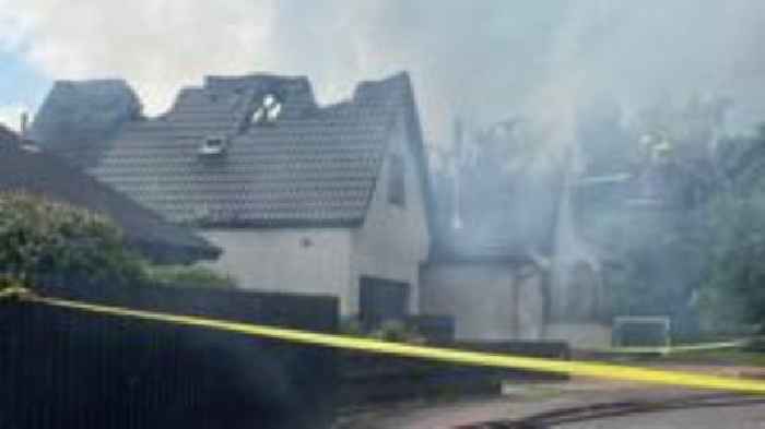 Two children and adult escape fire at house struck by lightning