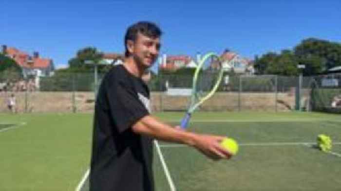 Tennis pro who beat cancer inspires youngsters