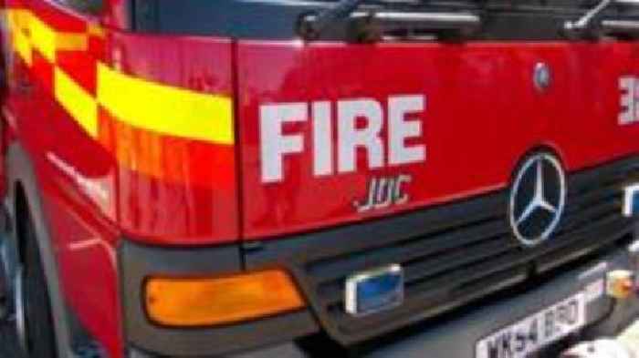 Woman arrested over suspicious house fire