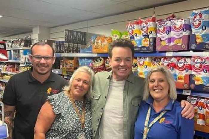 Dancing on Ice presenter Stephen Mulhern poses with fans in Minehead