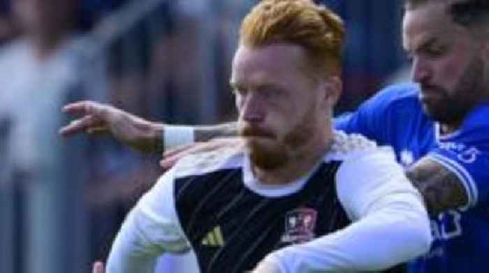 Woods rekindles 'love for football' at Exeter City