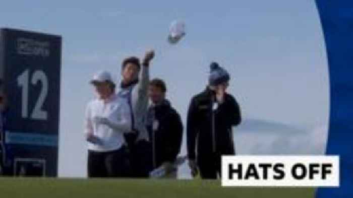 'There goes the hat!' - Caddy chases hat in wind