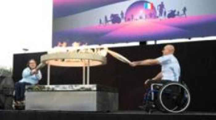 Paralympians light flame ahead of Paris games