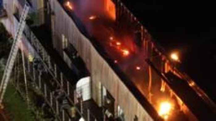 Arrested man bailed after late-night blaze at flats