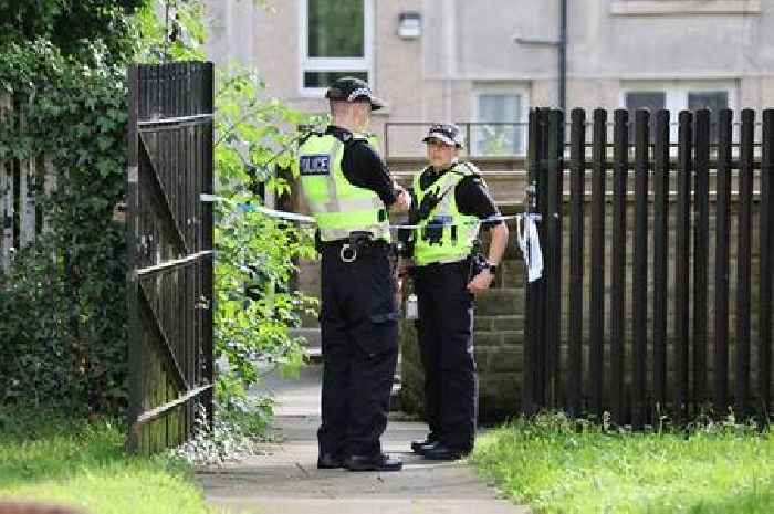 Murder probe launched after woman, 23, found dead at block of flats in Glasgow