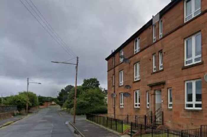 Woman found dead in block of flats in Glasgow as police probe 'unexplained' death