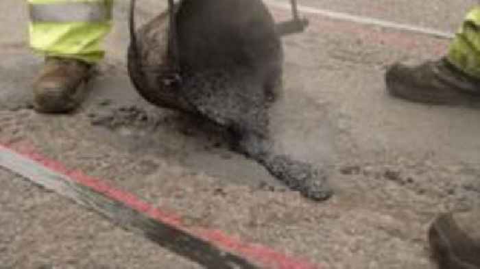 Watch: Old tyres used to repair potholes