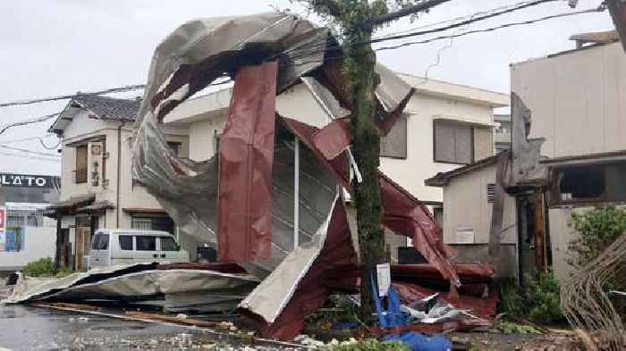 At least three dead as typhoon hits Japan and raises fears of flooding and landslides