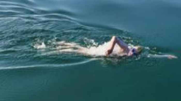 British swimmer believed to be fastest female to cross Lake Geneva