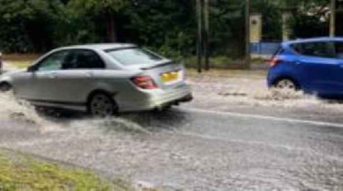 Half a month’s rain in 24 hours leaves roads flooded