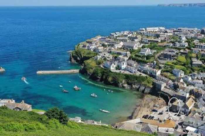 Charming home is just inches from Doc Martin beach and harbour