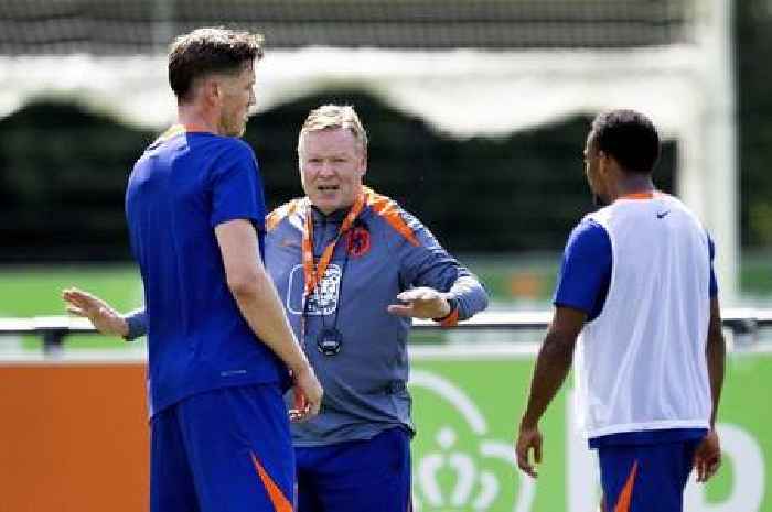 Arsenal's Jurrien Timber clashes with ex-Man Utd star Wout Weghorst during Netherlands training