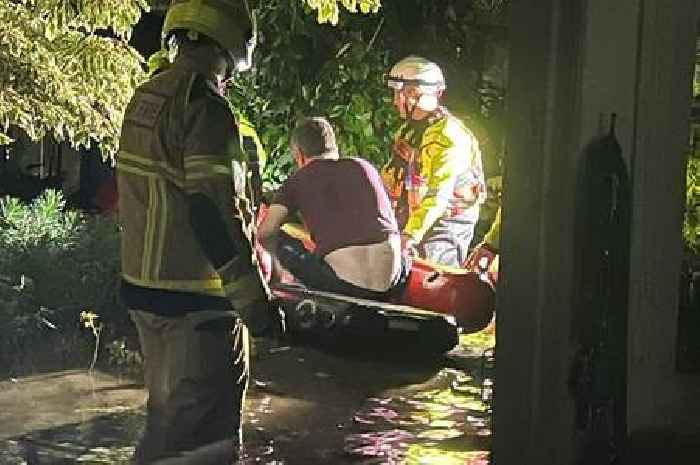 Wheelchair-bound artist rescued by boat during south Wales floods