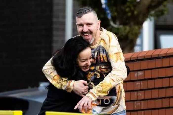 Inmates greet loved ones with smiles and hugs as they're released early from prison