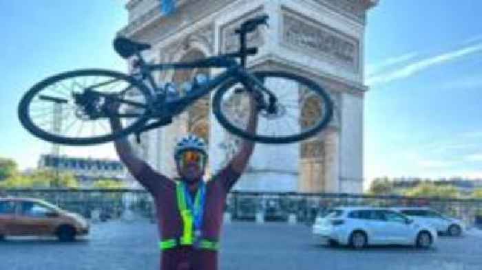 Dad beats record for 'world's hardest triathlon'