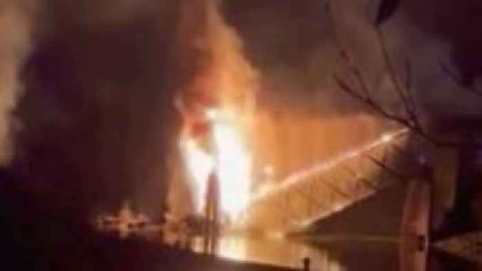 Watch: Burning Canadian bridge collapses into river