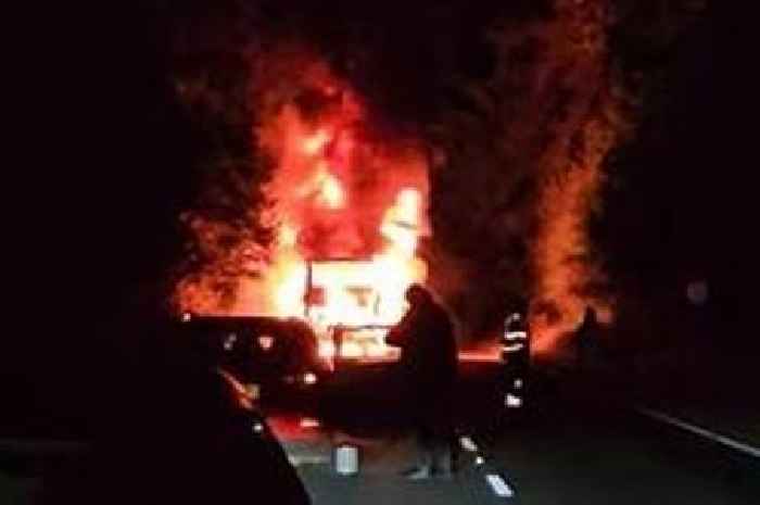 The dramatic moment a bus caught fire with the inferno sending flames leaping into the night sky