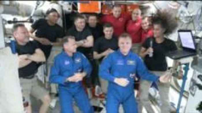 Joyful welcome by stranded astronauts for SpaceX capsule crew