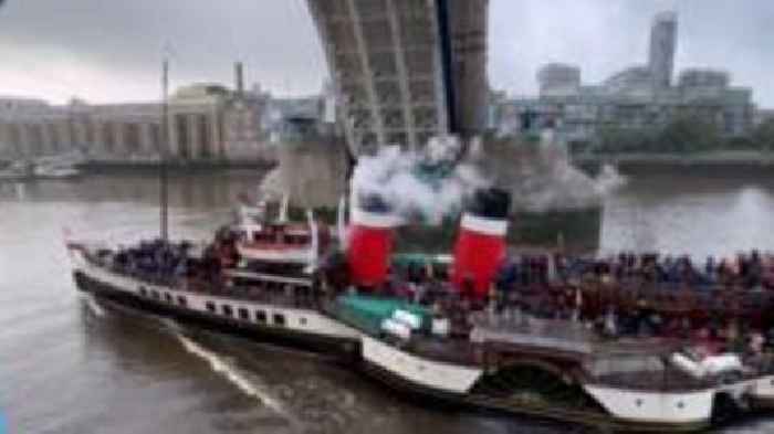 Moment The Waverley steams under London's Tower Bridge