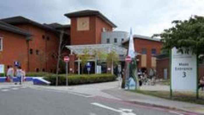Surgeon suspended for touching junior colleague