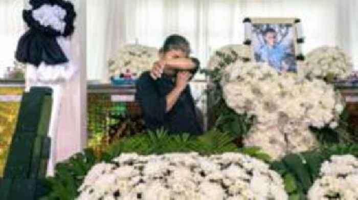 Weeping families mourn Thai bus fire victims at funeral