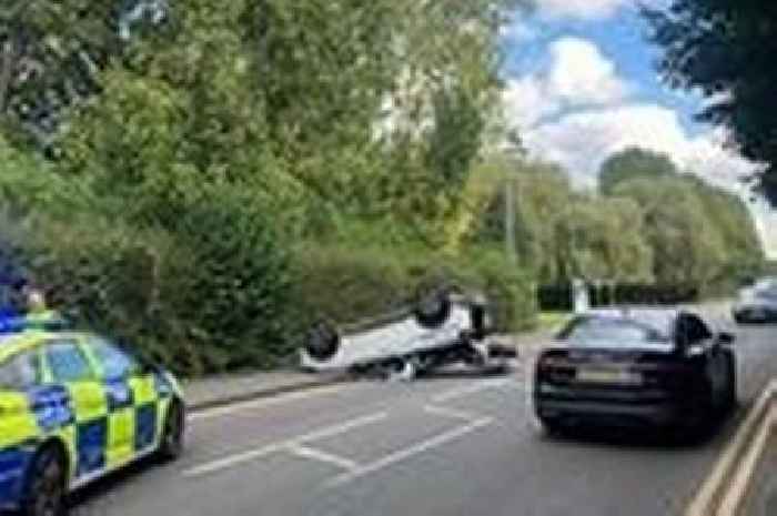 Car flipped on roof after huge crash on major Waltham Abbey road