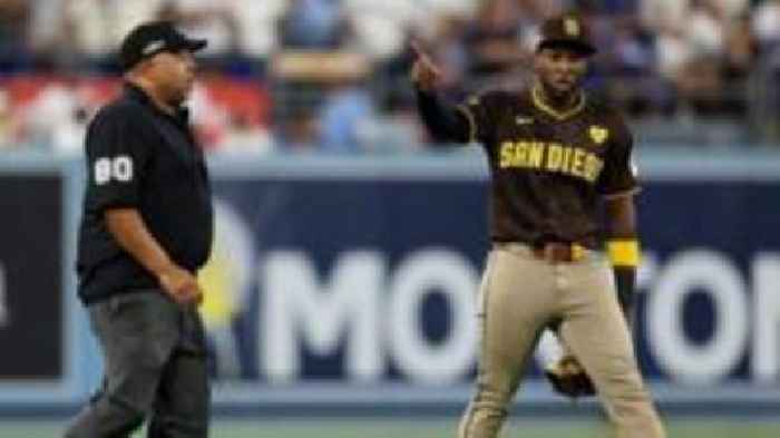 Dodgers-Padres match delayed after baseballs thrown at player