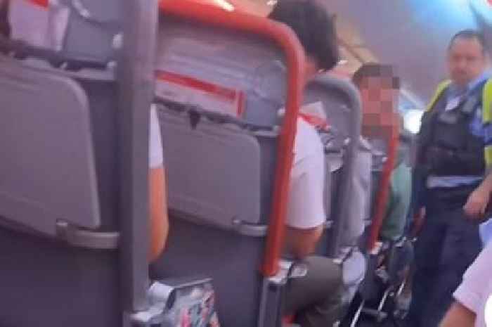 Moment Jet2 passengers hauled off Edinburgh plane by cops due to 'disruptive behaviour'