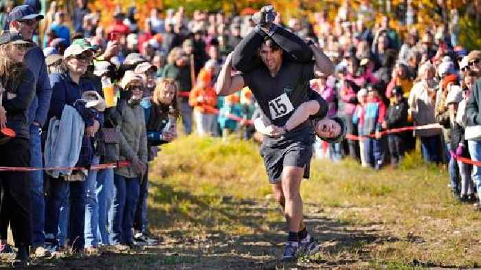 Mud, beer and cash: Annual wife-carrying championship takes Maine by storm