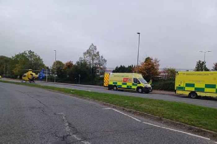 Air ambulance lands and road shut as 'collapsed' man dies