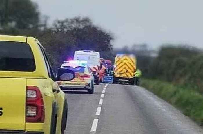 Woman dies after car crashes with school bus in West Country leaving boy, 5, fighting for life