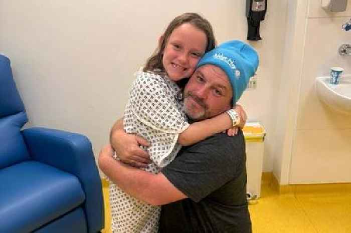 Dad was 'broken in half' after daughter's routine eye test quickly escalated to 11-hour surgery