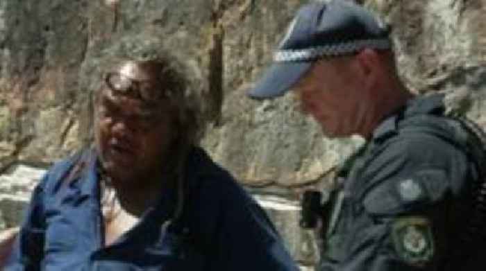 Aboriginal protester arrested during King's Sydney tour