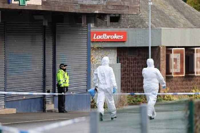 Forensic officers comb Hamilton streets outside community centre as murder probe launched