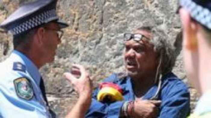 Aboriginal protester arrested as crowds greet King and Queen on Sydney tour