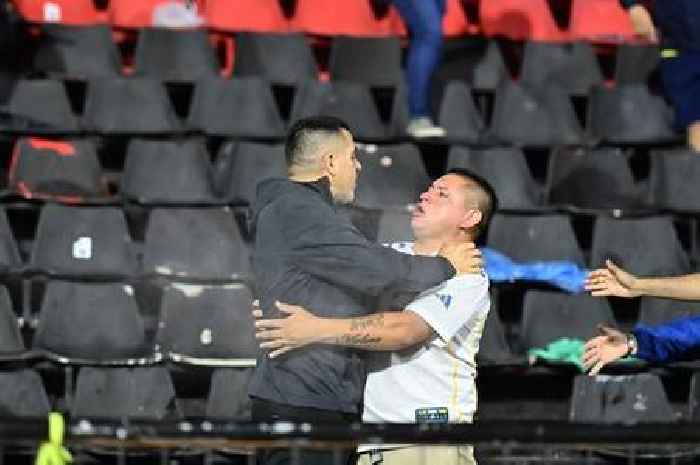 Ex-Barca and Argentina legend tries to stop riot as police fire tear gas into stands