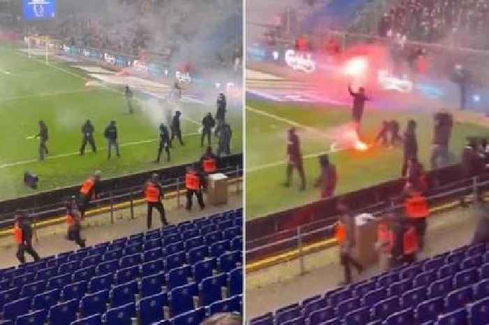 Ultras storm the pitch as fans run for cover during ugly scenes at Copenhagen derby