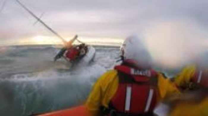 Crew rescued as yacht runs aground on sandbank