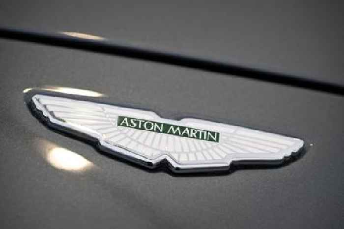 Aston Martin slashes loss by over £100m