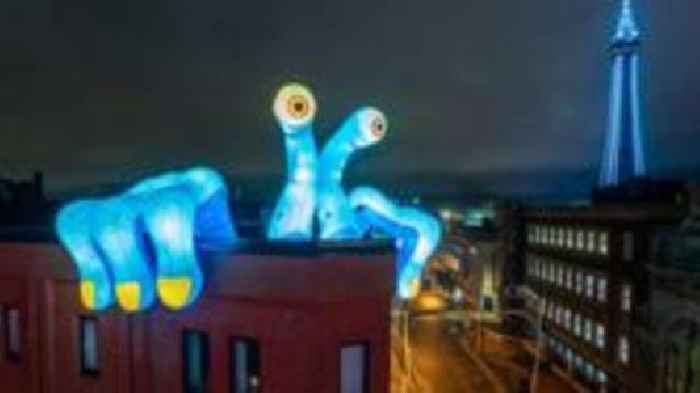 Giant inflatable monsters seen on resort rooftops