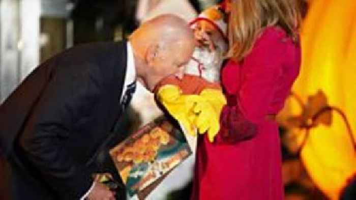 Watch: Biden playfully bites baby during White House trick or treat event