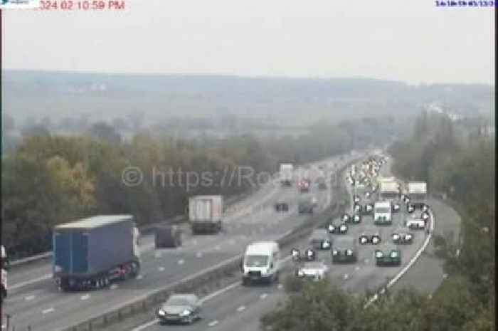 Man rushed to hospital after car hits tree and flips on its roof in M11 crash