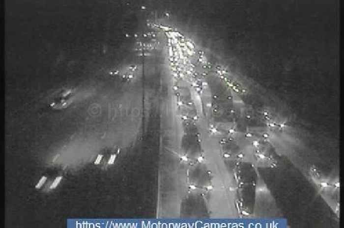 M25 live updates: Three-mile queues near Wisley after lorry crashes into roadworks